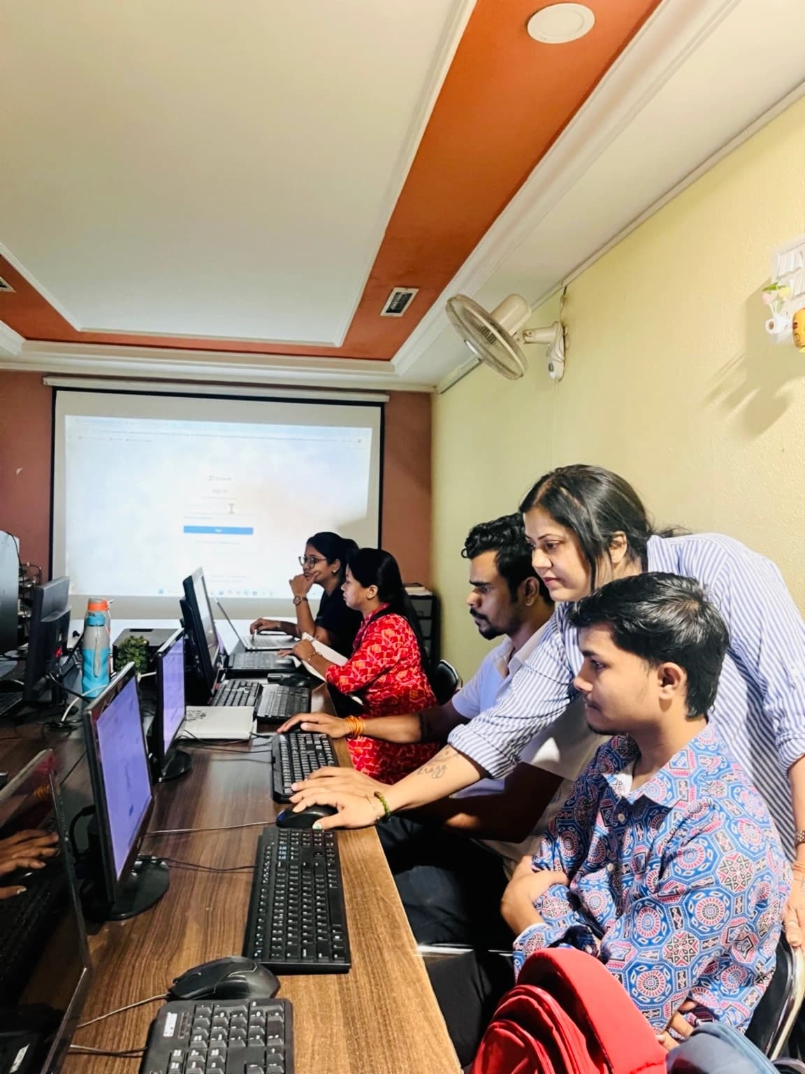 Art Tech Institute students practicing computer skills in the classroom