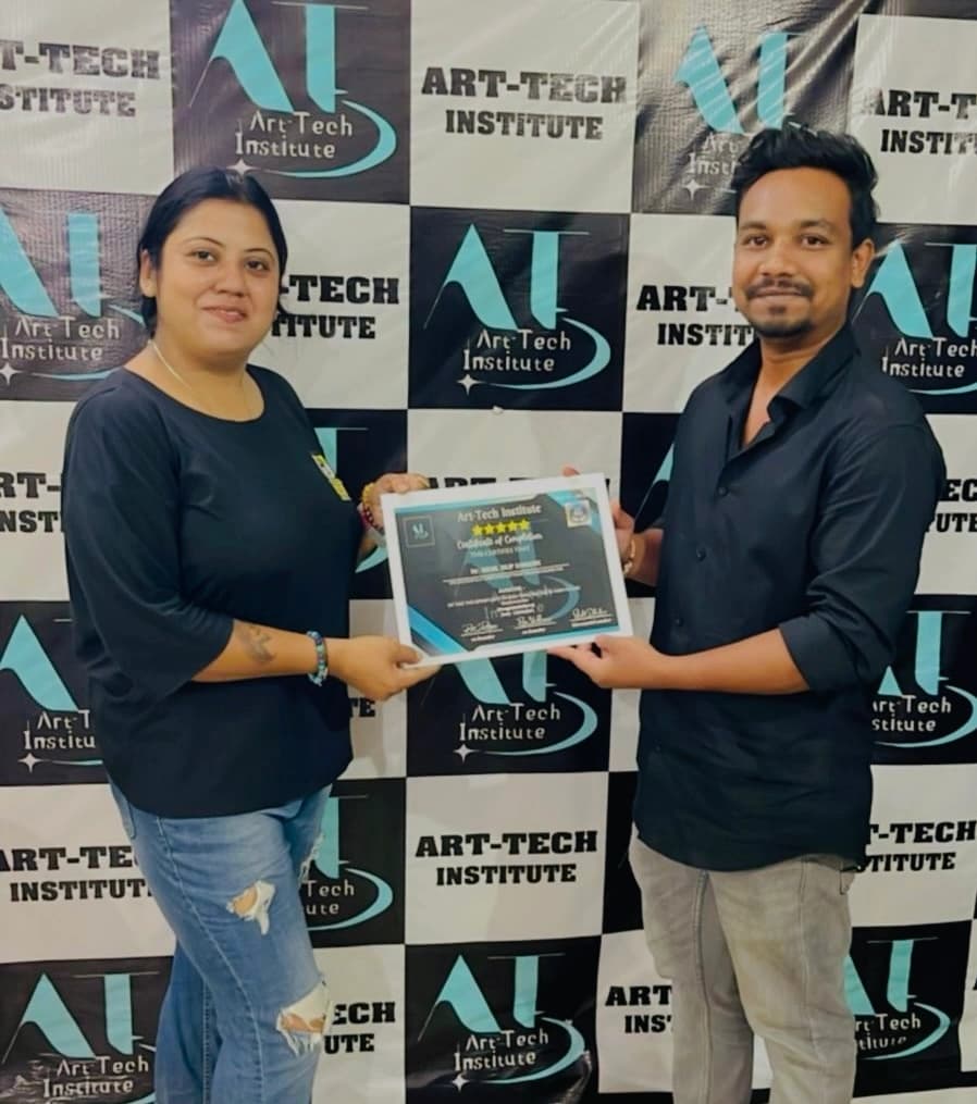 Art Tech Institute student receiving a certificate
